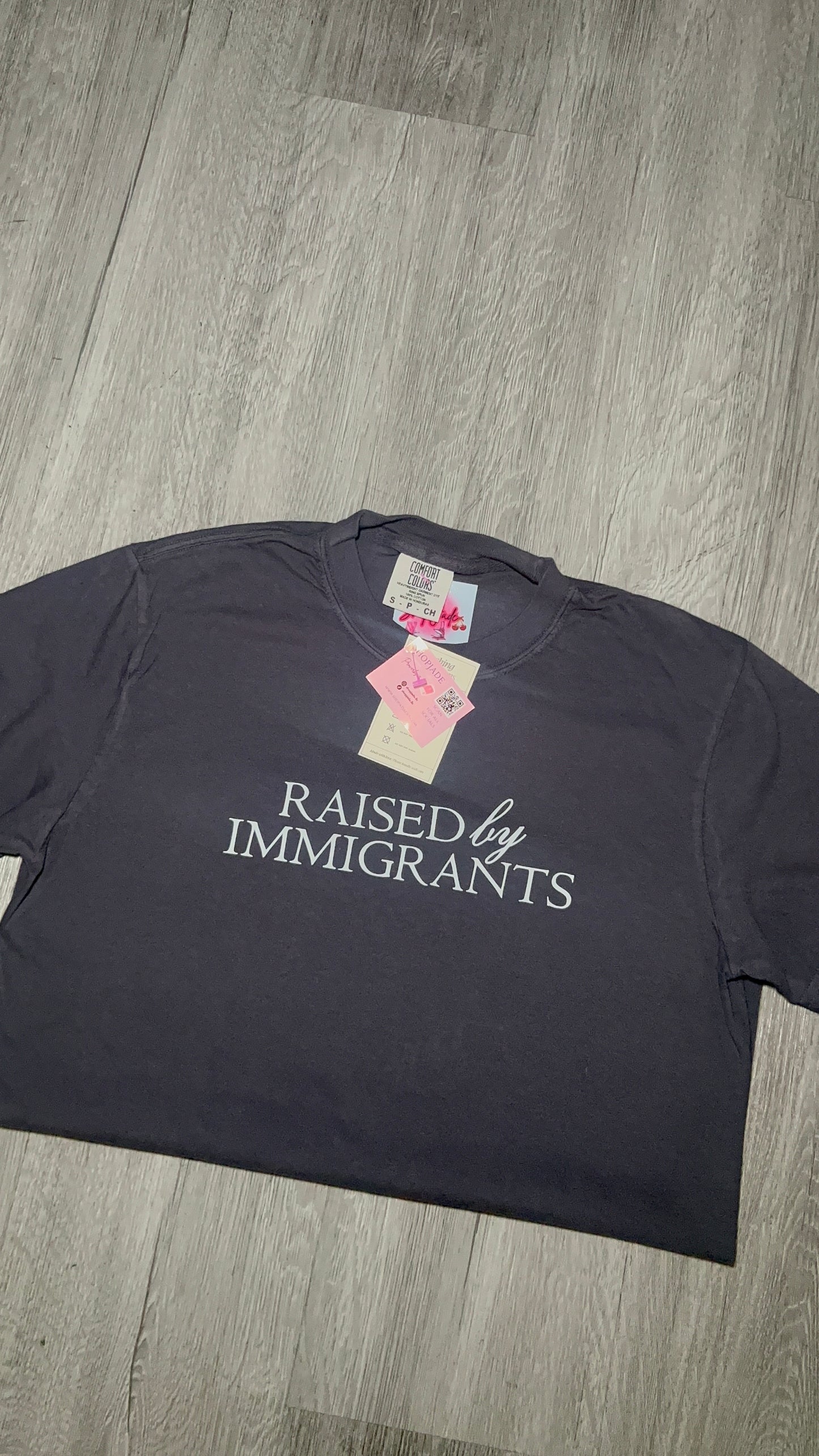 Raised by Immigrants Unisex Tees