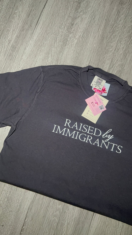Raised by Immigrants Unisex Tees
